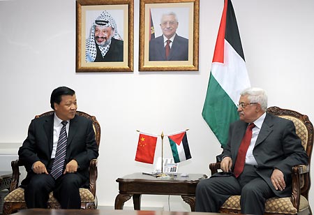 Palestinian National Authority(PNA) President Mahmoud Abbas (R) meets with Liu Yunshan, member of the Communist Party of China (CPC) Central Committee Political Bureau and head of the CPC Central Committee Publicity Department, in the West Bank city of Ramallah, Dec. 3, 2008. 