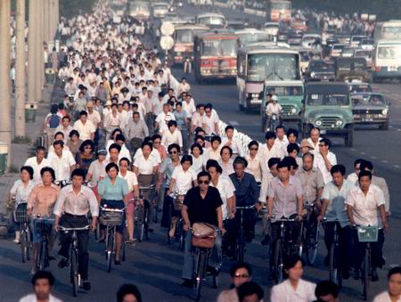 Beijing has a total of 7.3 million bicycles. If all these bicycles were placed 2 meters apart in a line, the line would extend almost half-way round the world.