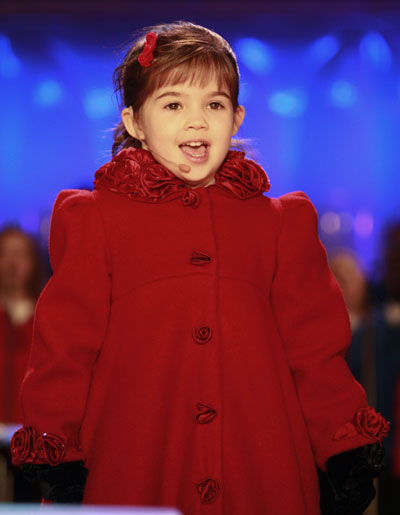 Four-year-old singer Kaitlyn Maher performs a Christmas carol during the National Christmas Tree lighting ceremony in Washington December 4, 2008.