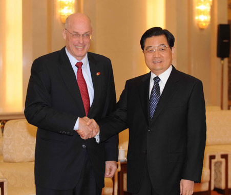 Chinese President Hu Jintao (R) meets with United States Treasury Secretary Henry Paulson at the Great Hall of the People in Beijing, capital of China, Dec. 5, 2008. [Xinhua]