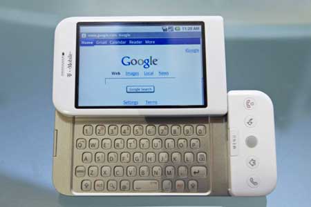 The new G1 phone running Google&apos;s Android software is displayed in New York Sept. 23, 2008. T-Mobile USA, a Deutsche Telekom AG unit, will sell the first phone powered by Google Inc&apos;s Android operating system under the brand name T-Mobile G1, said its partner Amazon.com Inc on Tuesday.