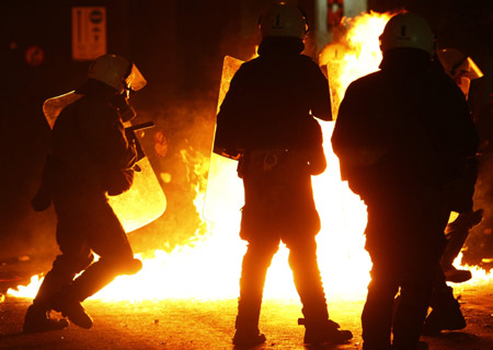 Riots raged in several cities after police shot dead a teenage boy in the Greek capital, in the Mediterranean nation's worst civil disturbances in years.