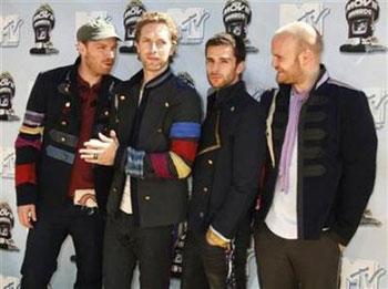 Members of the British band Coldplay pose at the 2008 MTV Movie Awards in Los Angeles June 1, 2008.[Fred Prouser/Reuters] 