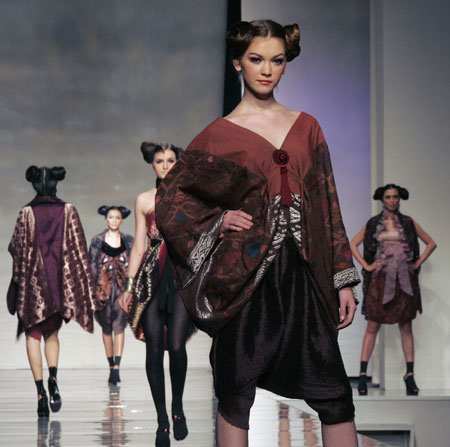 Models present creations by Indonesian designer Oka Diputra during Fashion Exploration 2009 in Jakarta December 4, 2008.