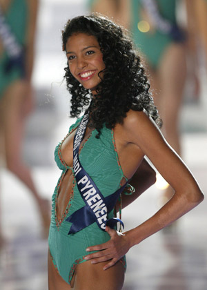 Chloe Mortaud from the Albigeois Midi Pyrenees region poses during the swimwear segment of the Miss France 2009 competition in Le Puy du Fou, western France Dec. 6, 2008.