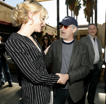 Director Steven Spielberg congratulates Australian actress Cate Blanchett, as director David Fincher (R) watches, at the ceremony where she received a star on the Walk of Fame in Hollywood, California December 5, 2008. Blanchett was the 2,376th celebrity to be honored with a star on the Walk of Fame.