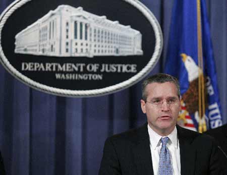 Patrick Rowan, Assistant Attorney General for the Justice Department's National Security Division, announces a 35-count indictment on five Blackwater security guards during a news conference in Washington December 8, 2008. 