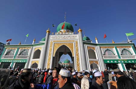 Chinese Muslims gather at a mosque in Yinchuan, northwest China's Ningxia Hui Autonomous Region, on Dec. 9, 2008. Muslims of Ningxia Hui Autonomous Region celebrated on Tuesday the Eid al-Adha festival, which falls on Dec. 9 this year. (Xinhua