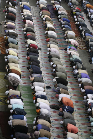 Muslims pray at Kashmir Mashid in Kathmandu December 9, 2008. Former Hindu state Nepal celebrated the holy Muslim festival of Eid-al-Adha from Tuesday, the government for the first time announcing a public holiday for the occasion and the first Koran in the Nepali language being offered to the faithful. [Agencies]