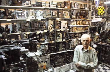 Camera collector Dimitris Pistiolas is seen at his museum in central Athens. The museum is the largest of its kind in the world. Pistiolas owns the world's largest private collection of movie cameras, 937 vintage models and projectors.