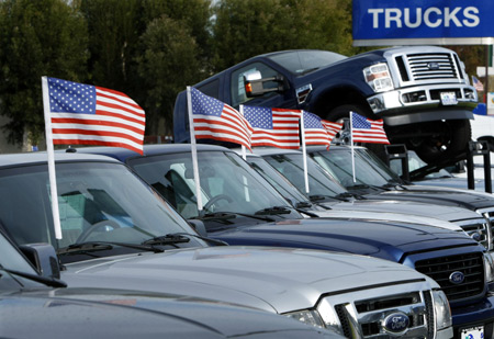 This file photo shows new trucks are displayed for sale at a Ford dealership in Encinitas, California November 11, 2008. The White House and the Congressional Democrats have sealed a bill to loan 15 billion dollars to help the country's crippled auto industry to avert bankruptcy, U.S. media said on December 10, 2008. [Xinhua/Reuters]