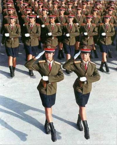 Zhou A squadron of female soldiers passes Tian'anmen Square during the National Day military parade on China's 50th anniversary on October 1, 1999. [ynet.com]