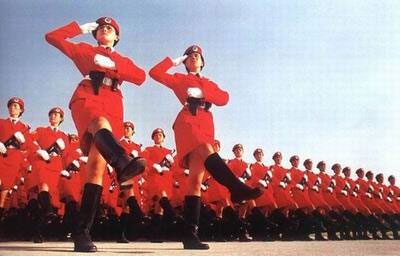 A squadron of female soldiers passes Tian'anmen Square during the National Day military parade on China's 50th anniversary on October 1, 1999. [ynet.com]