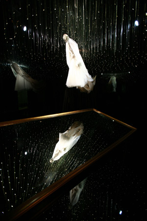  A dress designed by Christian Dior, an influential French fashion designer, is displayed at the Ullens Center for Contemporary Art at the 798 Art Zone in Beijing, capital of China, Dec. 10, 2008. 