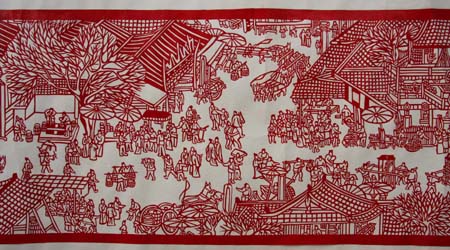 Photo taken on Dec. 13, 2008 shows a part of the paper-cut work of 'Riverside scenes at the Qingming Festival', created by Li Tongzhu, a 64-year-old retired man, in Zaozhuang City, east China's Shandong Province.