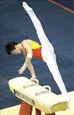 Zhang Hongtao of China in action en route to winning gold in the pommel horse.