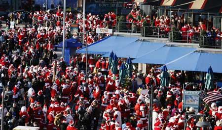 Revelers dressed as Santa Claus partake in the annual 'SantaCon' event in New York Dec. 13, 2008. 