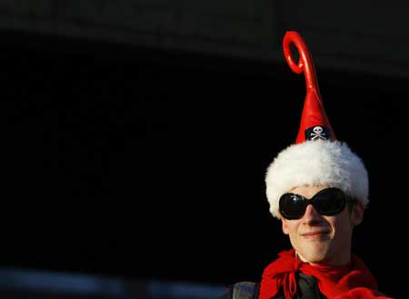 A reveller dressed as Santa Claus partakes in the annual 'SantaCon' event in New York Dec.13, 2008. 