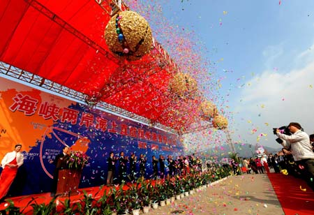  A ceremony for the start of direct sea transport between China's mainland and southeast China's Taiwan is held at Mawei Port of in Fuzhou, capital of southeast China's Fujian Province, Dec. 15, 2008. The Chinese mainland and Taiwan started direct air and sea transport and postal services Monday morning. 