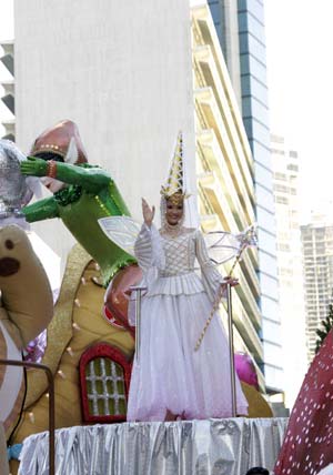  A girl dressed like a fairy waves during the annual parade for the upcoming Christmas Day, in Panama City, Panama, Dec. 14, 2008. 
