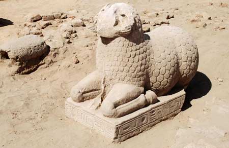 One of three unearthed ancient statues is seen at a dig at el-Hassa, the site of a Meroitic town in Sudan in this undated handout photograph. 