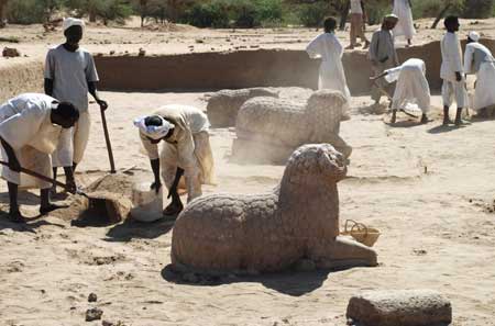 Three ancient statues are seen at a dig at el-Hassa, the site of a Meroitic town in Sudan in this undated handout photograph. Archaeologists said on Tuesday they had discovered three ancient statues in Sudan with inscriptions that could bring them closer to deciphering one of Africa's oldest languages. 