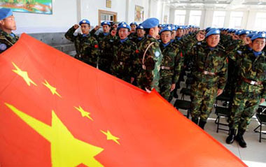Members of the peacekeeping transport team about to go to Liberia attend an oath-taking ceremony in Hohhot, north China's Inner Mongolia Autonomous Region Dec. 17, 2008. The transport team, including 240 soldiers and officers of China's Inner Mongolia military area, will go to Liberia to fulfill its eight-month mission.