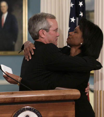 U.S. Secretary of State Condoleezza Rice (R) greets David Welch, Assistant Secretary for Near Eastern Affairs, at the State Department in Washington December 18, 2008. Welch steps down from the State Department for the private carrier. 