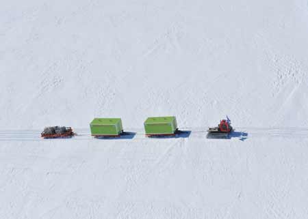 The aerial photograph taken on Dec. 18, 2008 shows vehicles of Chinese 25th Antarctic expedition team moving in Antarctica. 