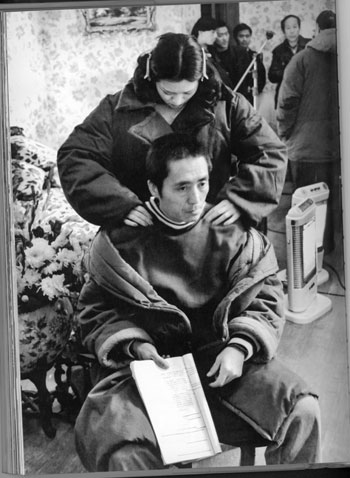 1995, actress Gong Li gives director Zhang Yimou a massage on a film set in Shanghai. At the time the two were an item - their relationship shaped Chinese cinema for the next decade and made Gong famous around the world. [China Daily]