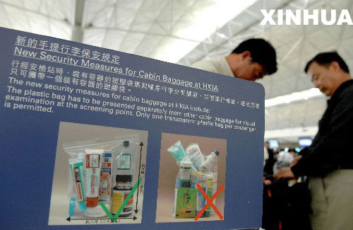 New security measures for cabin baggage are carried in Hong Kong in this file photo taken on March 21, 2008.
