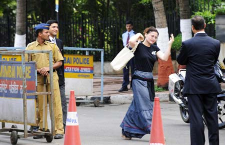 A guest enters into the Trident hotel of the Oberoi Group in Bombay, India, Dec. 21, 2008. 