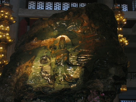 Photo taken on December 19, 2008 shows the Pu-Sa Buddha at the Jade Shakyamuni Buddha Park of Anshan city, northeast China's Liaoning province. The Jade Shakyamuni Buddha statue carved out of a 260-ton jade stone is being displayed here for worshippers from all over the world. The statue was accredited as the biggest of its kind in the world by the Guinness World Records in December 2002. [Chinadaily.com.cn] 