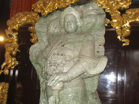 Photo taken on December 19, 2008 shows one of the Four Heavenly Kings at the Jade Shakyamuni Buddha Park of Anshan city, northeast China's Liaoning province. The Jade Shakyamuni Buddha statue carved out of a 260-ton jade stone is being displayed here for worshippers from all over the world. The statue was accredited as the biggest of its kind in the world by the Guinness World Records in December 2002. [Chinadaily.com.cn] 