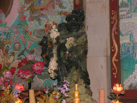 Photo taken on December 19, 2008 shows a statue of Maitreya Buddha or happy-face Buddha at the Jade Shakyamuni Buddha Park of Anshan city, northeast China's Liaoning province. The Jade Shakyamuni Buddha statue carved out of a 260-ton jade stone is being displayed here for worshippers from all over the world. The statue was accredited as the biggest of its kind in the world by the Guinness World Records in December 2002. [Chinadaily.com.cn]