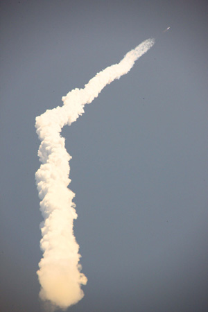 China's third geostationary meteorological satellite, the Fengyun-2-06, is launched on a Long March-3A carrier rocket at the Xichang Satellite Launch Center in southwest China's Sichuan Province, Dec. 23, 2008. [Li Gang/Xinhua] 