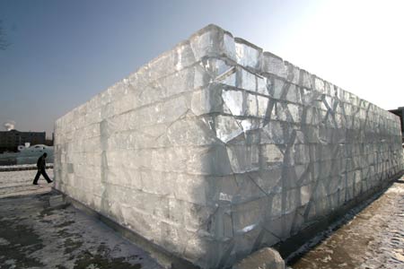 Photo taken on Dec. 21, 2008 shows an ice sculpture named 'Water Cube' at the Century Square in Jilin city, northeast China's Jilin Province. An ice lantern show will be held in Jilin city on Dec. 23, 2008. 