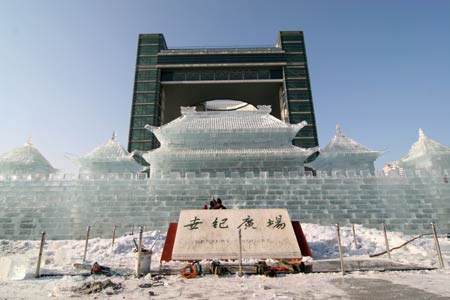 Photo taken on Dec. 21, 2008 shows an ice sculpture in the shape of a Chinese ancient architecture at the Century Square in Jilin city, northeast China's Jilin Province. An ice lantern show will be held in Jilin city on Dec. 23, 2008. 