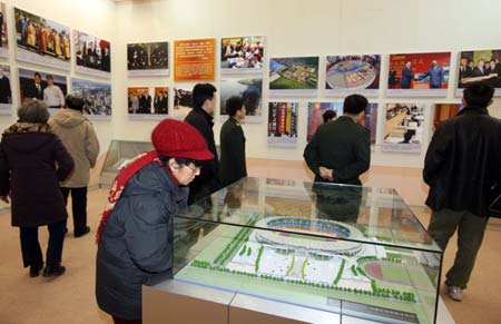 Visitors are seen at the exhibition commemorating the 30th anniversary of China&apos;s reform and opening up, held in Beijing, capital of China, on Dec. 22, 2008. 