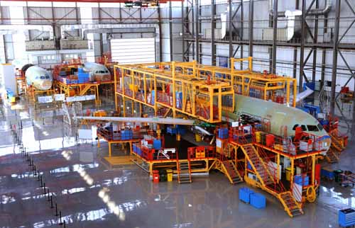 Three Airbus A320 are assembled at general assemble workshop in north China's Tianjin municipality, on Dec. 23, 2008. It is estimated that the first plane will be painted in early 2009. 