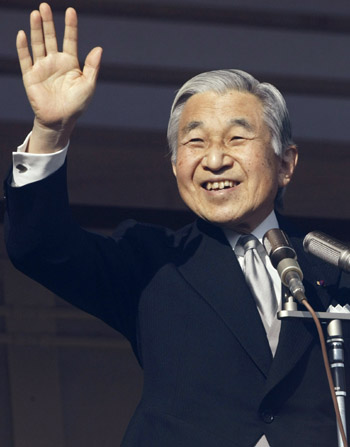 Japan's Emperor Akihito waves to well-wishers as he celebrates his 75th birthday at the Imperial Palace in Tokyo December 23, 2008.
