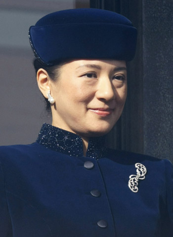 Japan's Crown Princess Masako appears before well-wishers as she celebrates Emperor Akihito's 75th birthday at the Imperial Palace in Tokyo December 23, 2008. 