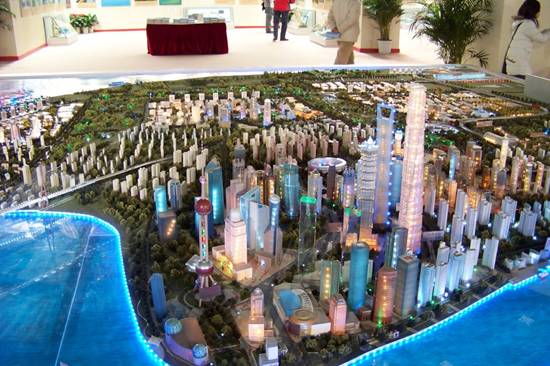Scale model of the Shanghai Pudong Economic Development Zone. One of the first key economic development zones, Pudong features several skyscrapers including the Jinmao Tower, Shanghai World Financial Center, and the Shanghai Center (under construction). [Maverick Chen/China.org.cn]