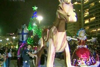 In Brazil, thousands of people gathered along Rio de Janeiro's famous Copacabana beach on Saturday night, to watch the city's annual Illuminated Christmas parade. 