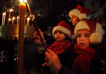 In Iraq, Christian and Muslim schoolchildren celebrated Christmas Eve at their school in eastern Baghdad.
