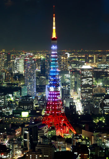  The Tokyo Tower is decorated with colorful lights in Tokyo, capital of Japan, to marks it's 50th anniversary on December 25, 2008. The 333-meter-high tower opened to public in Dec. 23, 1958, and has attracted about 157 million tourists since then. [Xinhua]