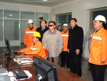 Kim Jong Il (C), top leader of the Democratic People's Republic of Korea, inspects a steel-making enterprise in south pyong'an-do in DPRK in this picture released by Korean Central News Agency of DPRK.[Xinhua]