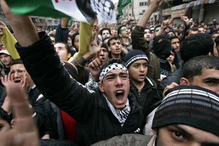 Jordanians shout anti-Israel and anti-U.S. slogans during a demonstration against Israeli air strikes in the Gaza Strip, in Amman December 27, 2008. Israeli warplanes and helicopters pounded the Hamas-ruled Gaza Strip on Saturday, killing at least 195 people in one of the bloodiest days in the Palestinians' conflict with Israel.[Xinhua/Reuters]