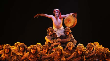 Dancers perform during a party marks the 50th anniversary of the Tibetan Autonomous Region Song and Dance Troupe in Lhasa, capital of west China's Tibetan Autonomous Region, Dec. 28, 2008. 