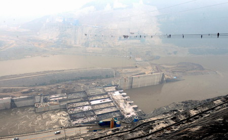 An overlook of the Xiangjiaba Hydropower Station, China's third largest hydropower plant which makes use of the Jinsha River, a tributary of Yangtze River. The river at Xiangjiaba was blocked on Sunday to make way for construction of the hydropower project on December 28, 2008. [Xinhua] 